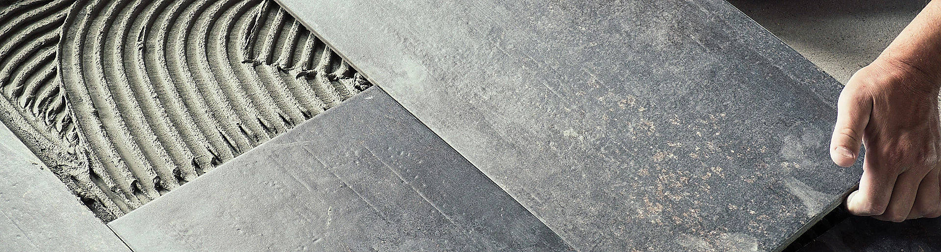 Symbolfotos zu Leistungen der FirmaSchnell Fliesen, wie Badsanierung, Fliesenverlegung, Terrassen- und Balkonrenovierung